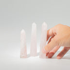 Polished rose quartz obelisk point, a six faced pale pink crystal tower - view 5
