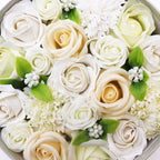 Round box packed with white and ivory soap roses, seen from above on cotton-rag paper - view 5