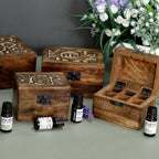 Carved mango wood box open to show the grid of 32 bottle compartments - view 5