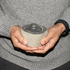 Small grounding pot carved from a single riverstone, with a fitted stone lid, rough outside and smooth within - view 7