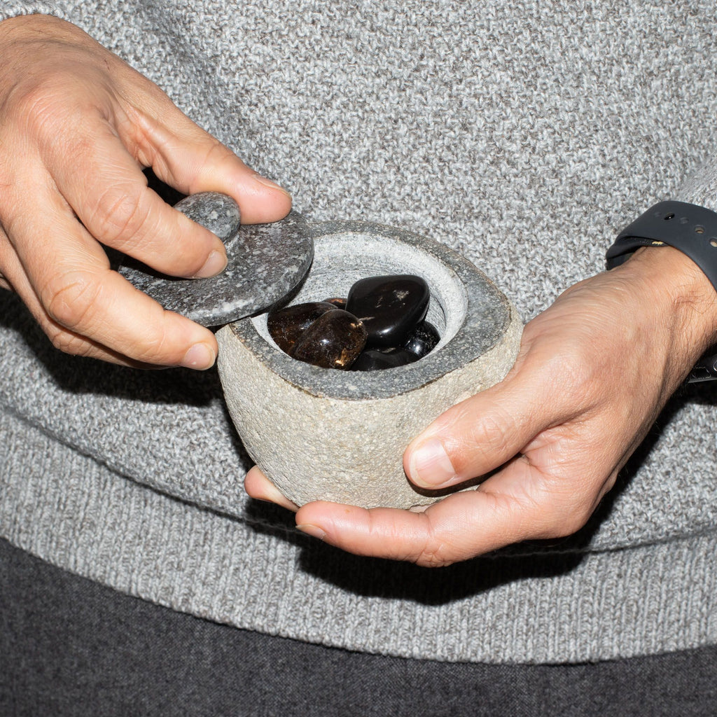 Small grounding pot carved from a single riverstone, with a fitted stone lid, rough outside and smooth within - view 10