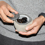 Small grounding pot carved from a single riverstone, with a fitted stone lid, rough outside and smooth within - view 10