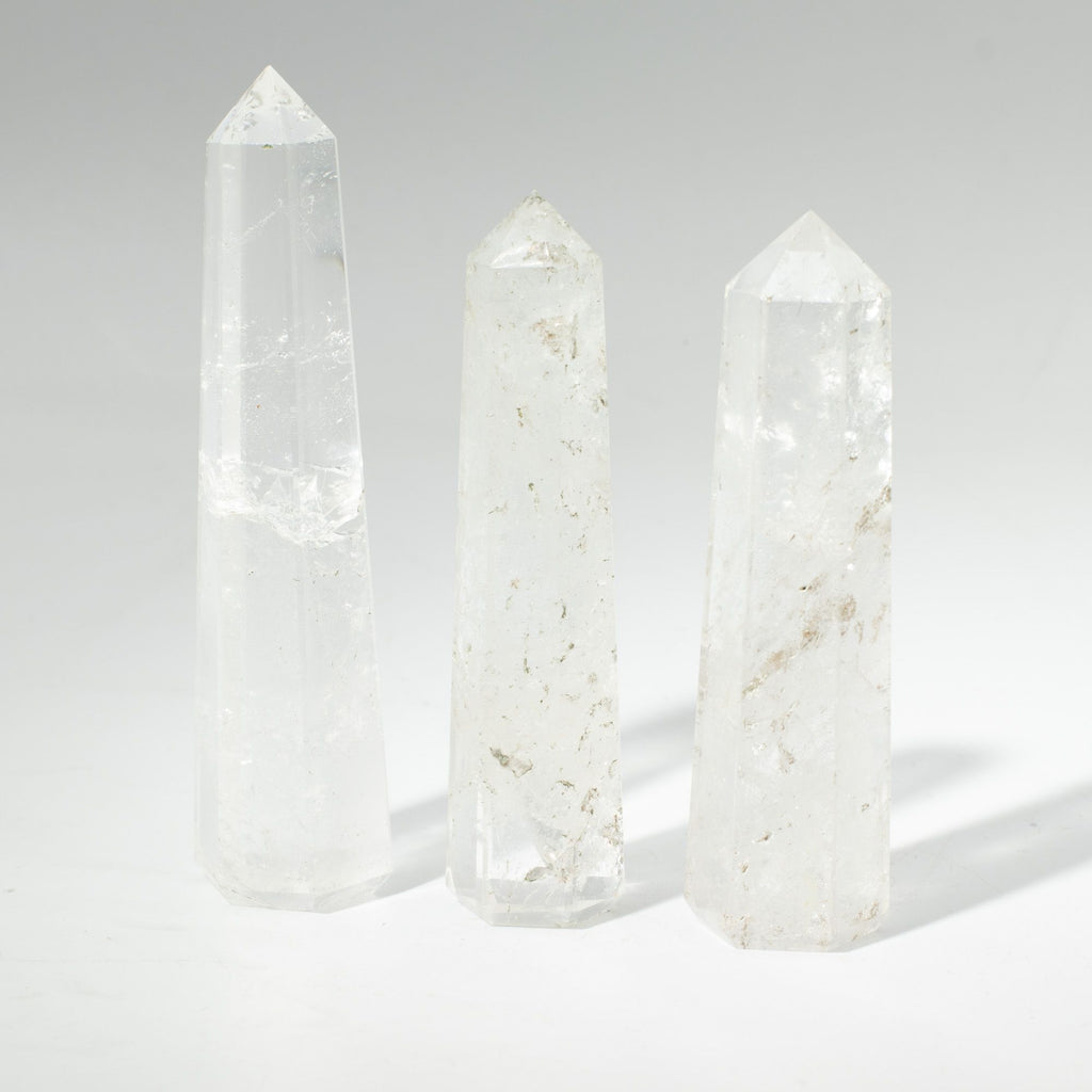 Clear quartz six face obelisk point, polished and rising to an apex - view 6