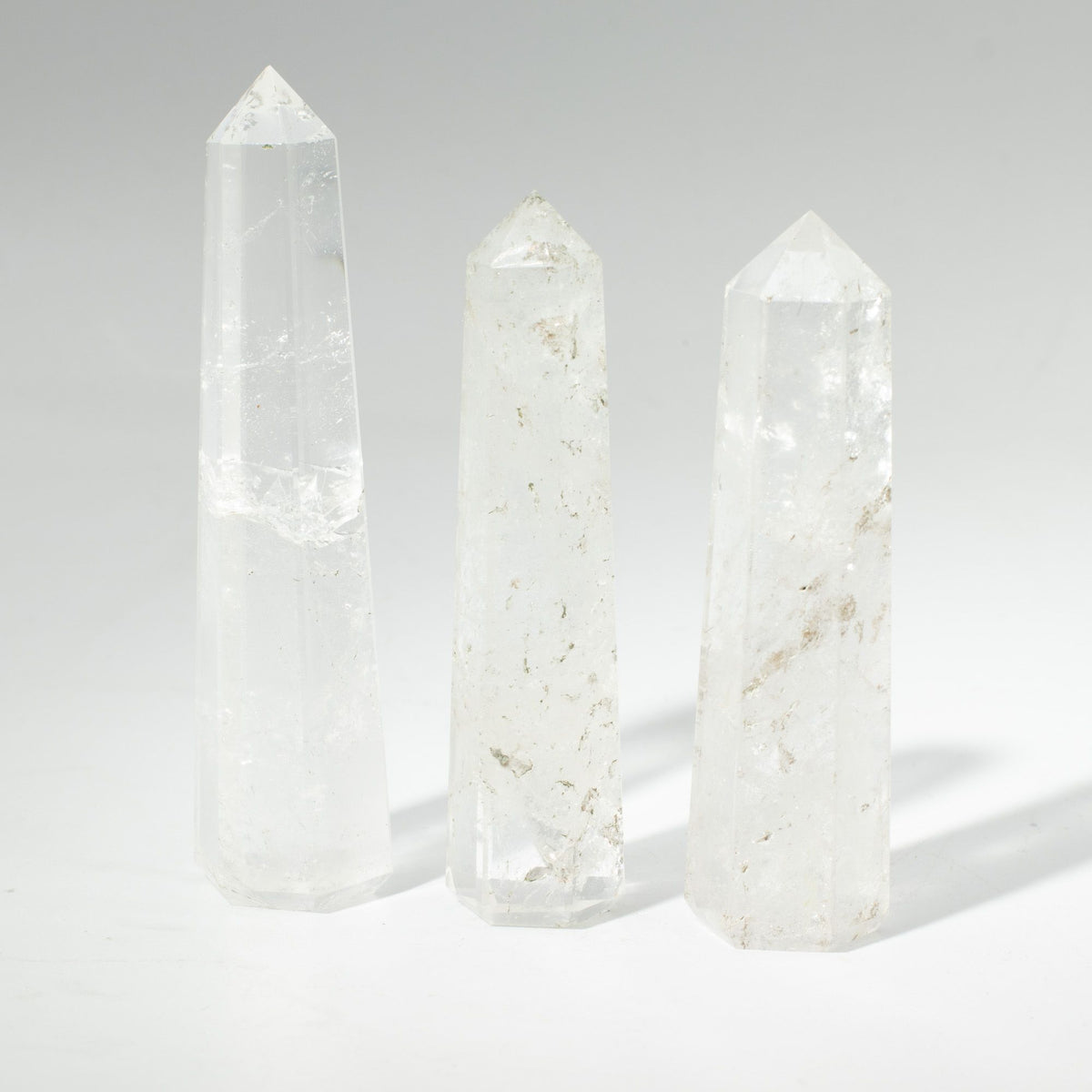 Clear quartz six face obelisk point, polished and rising to an apex - view 6