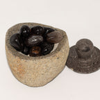 Medium grounding pot carved from a single riverstone, with a fitted stone lid, rough outside and smooth within - view 3