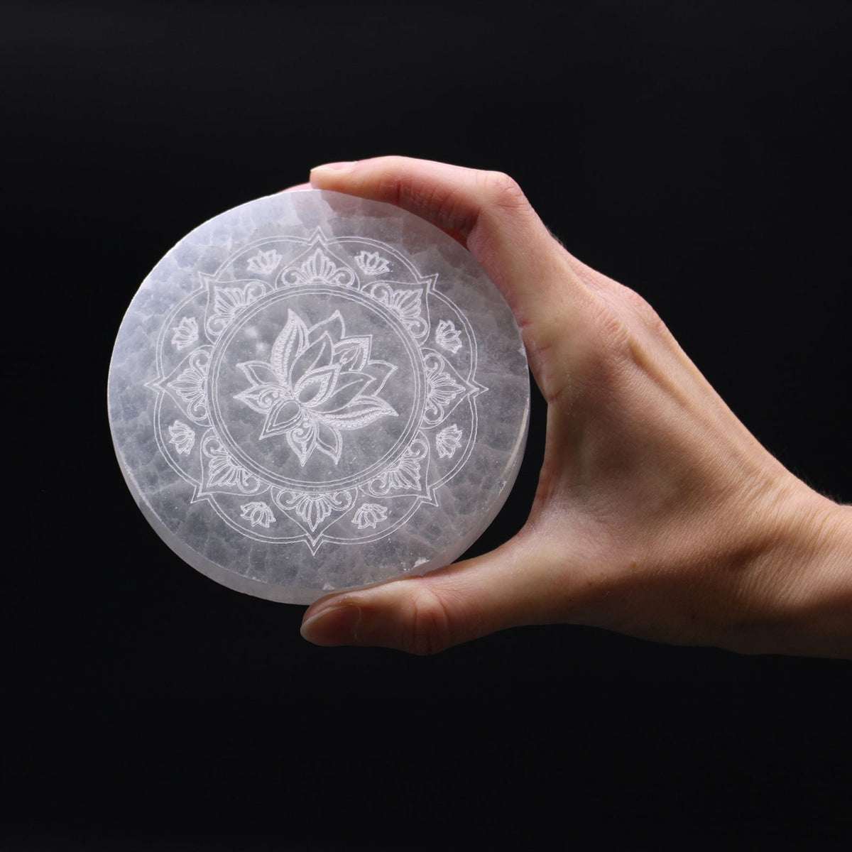 Medium round selenite charging plate engraved with a lotus mandala