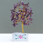 Small amethyst chipstone tree on a hand-painted stone base, on rumpled linen - view 3