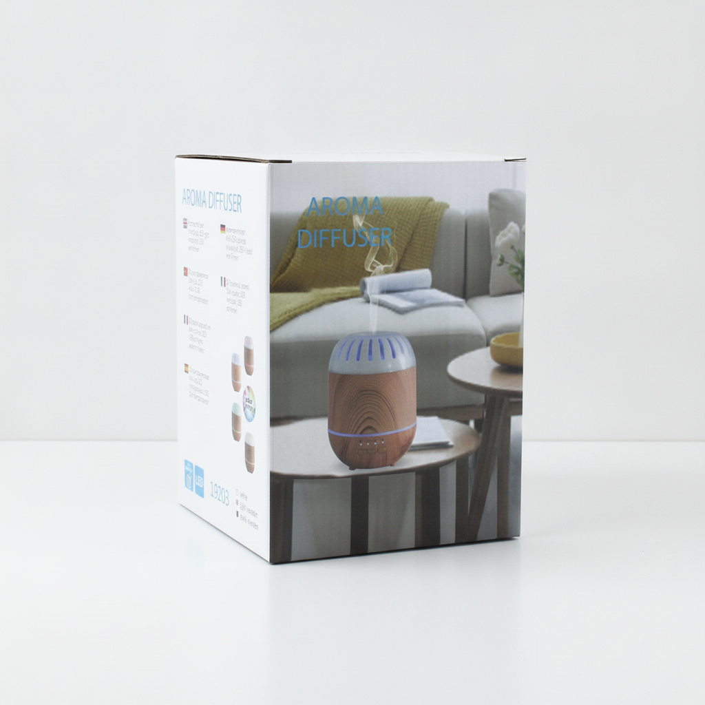 Copenhagen wood-effect aroma diffuser on a clean white surface against a white wall