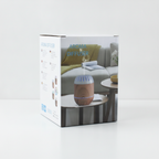 Copenhagen wood-effect aroma diffuser on a clean white surface against a white wall
