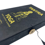 Close-up of the Tantra Yoga box lid with gold lettering and a button and string clasp