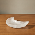 Crescent moon dish carved from white Moroccan selenite