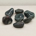 Extra large bloodstone tumble stones on cotton canvas