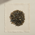 Labradorite gemstone chips on cotton rag paper
