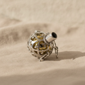 Silver angel bell pendant Night-time with black stone on natural linen