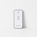 Small white remote control for the salt stone diffuser