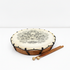 Hamsa frame drum lying flat to show the wooden frame and lacing, two beaters beside it