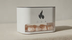 White flame effect aroma diffuser with Himalayan salt chamber on cotton canvas