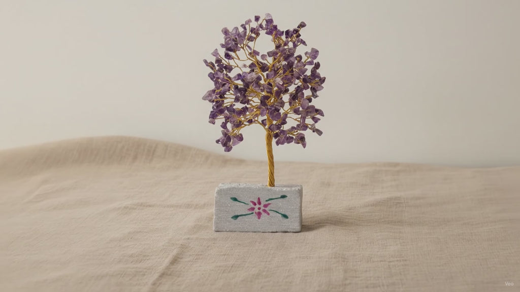 Small amethyst chipstone tree on a hand-painted stone base, on rumpled linen video
