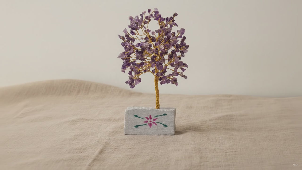 Small amethyst chipstone tree on a hand-painted stone base, on rumpled linen video