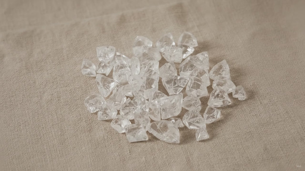 Small apophyllite raw crystal points on natural linen