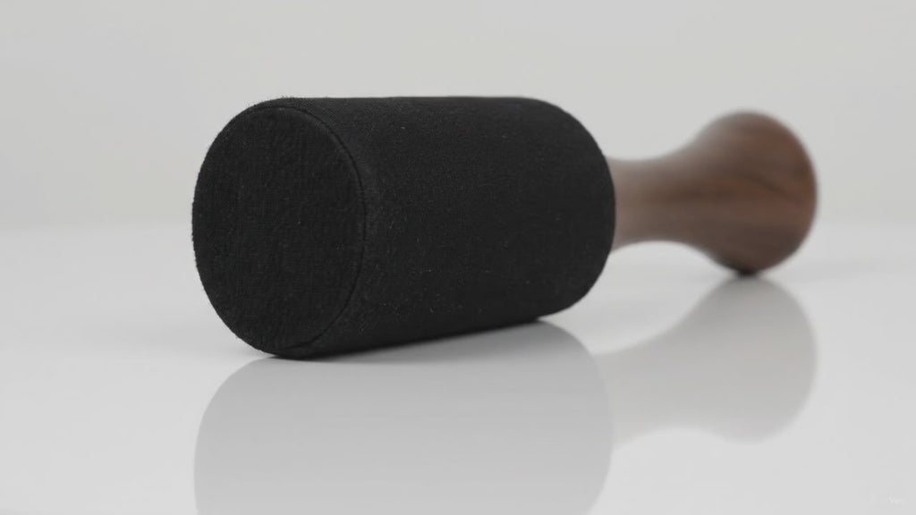 Large wooden king stick striker for singing bowls, slow product video
