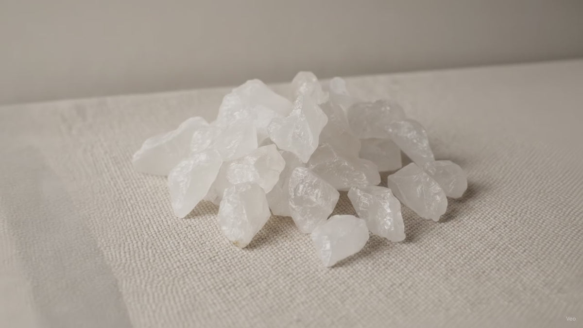 Rough milky quartz chunks piled on cotton canvas video
