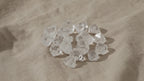 Medium apophyllite raw crystal points on natural linen