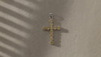 Silver-plated crucifix pendant set with golden citrine-coloured stones, on linen video