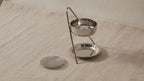 Plated brass incense warmer with mesh dish and tealight tray, on rumpled linen video