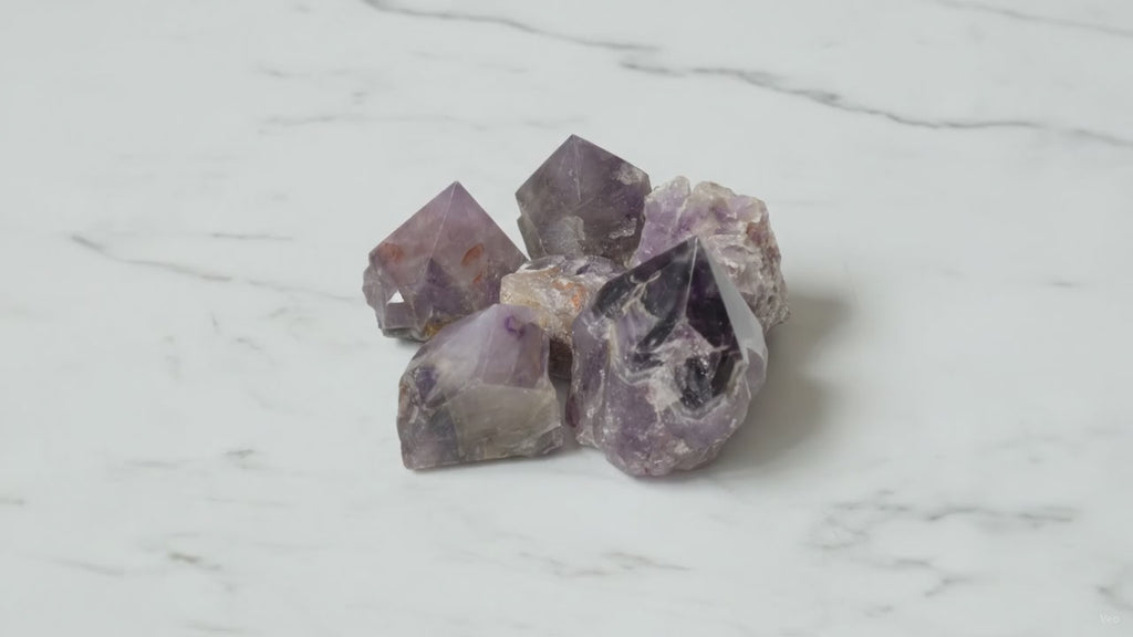 Amethyst A grade crystal points, group of five, slow zoom