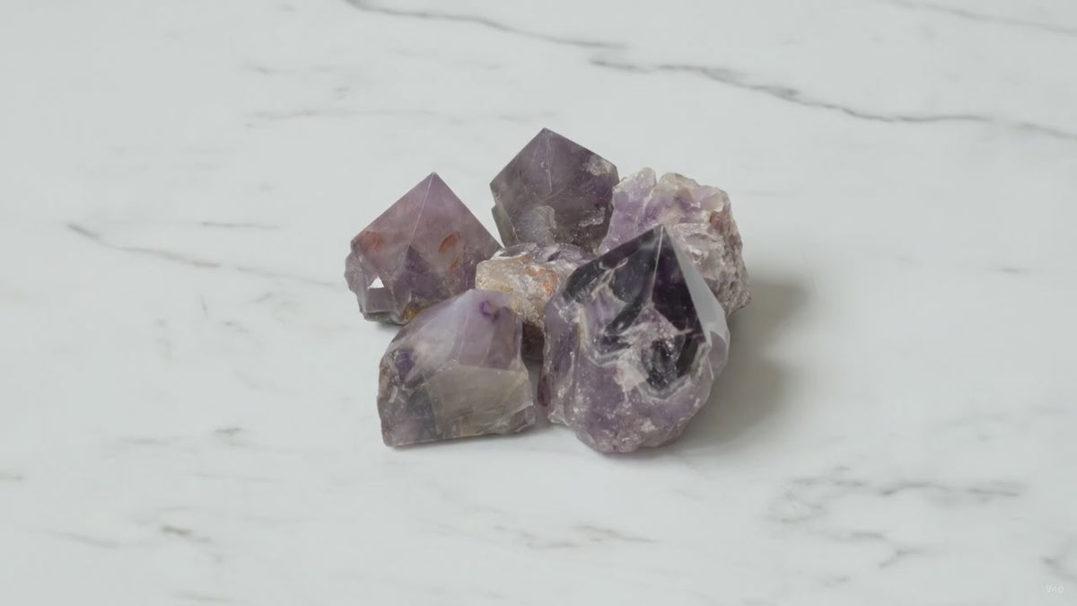 Amethyst A grade crystal points, group of five, slow zoom