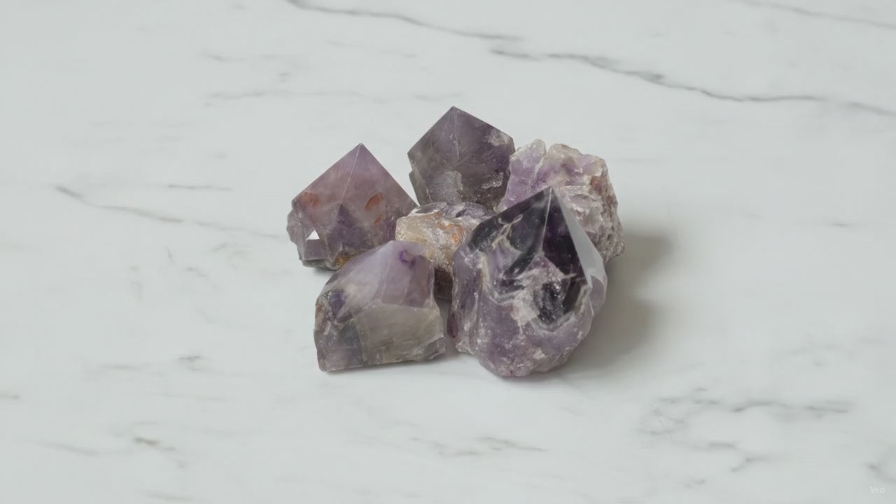 Amethyst A grade crystal points, group of five, slow zoom