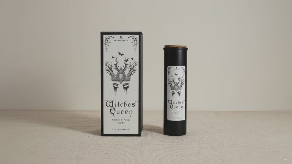 Black Witches' Queen candle tube beside its illustrated box, on cotton canvas video