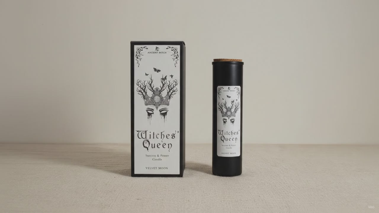 Black Witches' Queen candle tube beside its illustrated box, on cotton canvas video