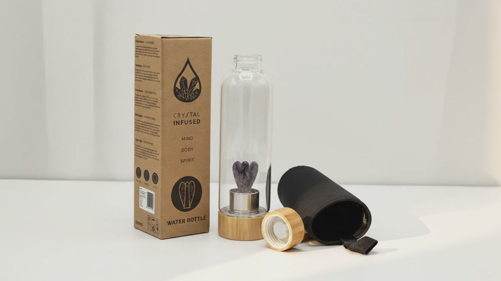 Amethyst angel crystal water bottle with bamboo lid, box and padded sleeve, soft light moving across the wall