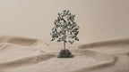 Moss agate chipstone tree on a speckled orgonite base, on rumpled linen video