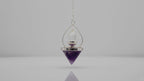 Amethyst and rock quartz Lantern of Life pendulum, slow product video