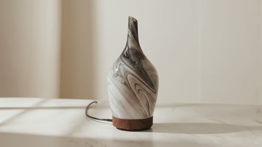 Abstract grey marbled glass aroma diffuser, slow camera orbit