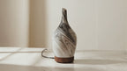 Abstract grey marbled glass aroma diffuser, slow camera orbit