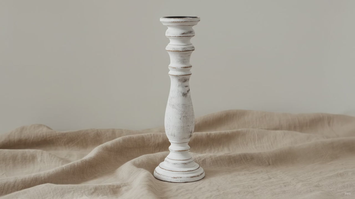 Whitewash mango wood pillar candle holder on natural linen