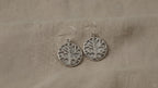 Tree of Life silver drop earrings with mother of pearl on natural linen