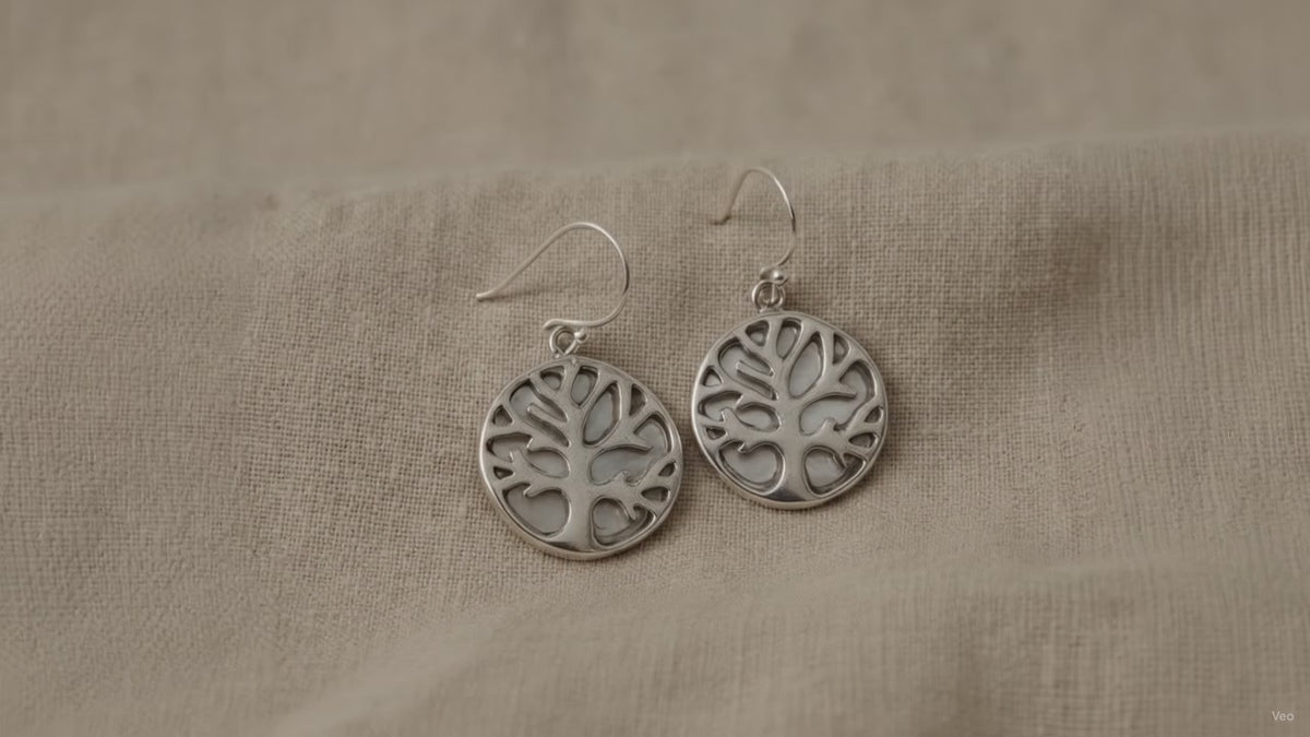 Tree of Life silver drop earrings with mother of pearl on natural linen