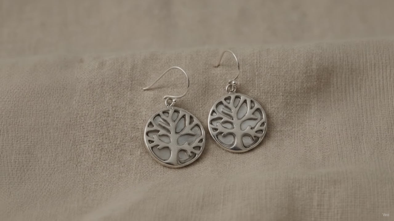 Tree of Life silver drop earrings with mother of pearl on natural linen