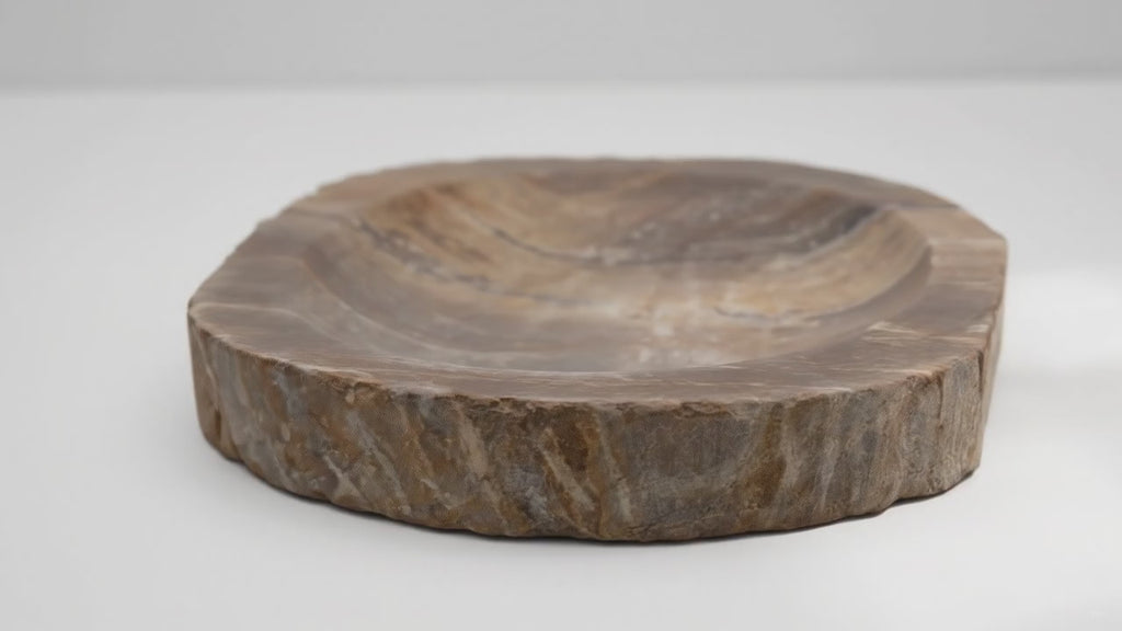 Video of the petrified wood soap dish, with the camera slowly moving around it