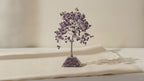 Amethyst chipstone tree on a purple orgonite base, on cotton-rag paper video
