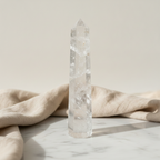Tall six-sided clear quartz obelisk point