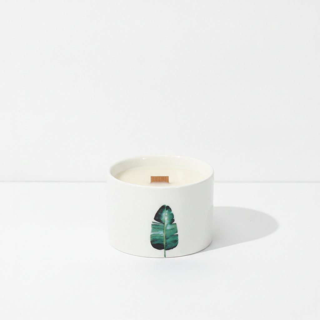 Set of 3 mulberry harvest botanical candles on a clean white surface against a white wall
