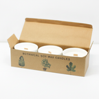 Set of 3 mulberry harvest botanical candles on a clean white surface against a white wall