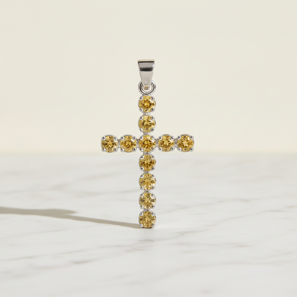 Silver-plated crucifix pendant set with golden citrine-coloured stones, on linen - view 2