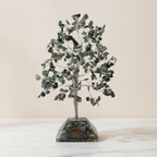 Moss agate chipstone tree on a speckled orgonite base, on rumpled linen - view 2